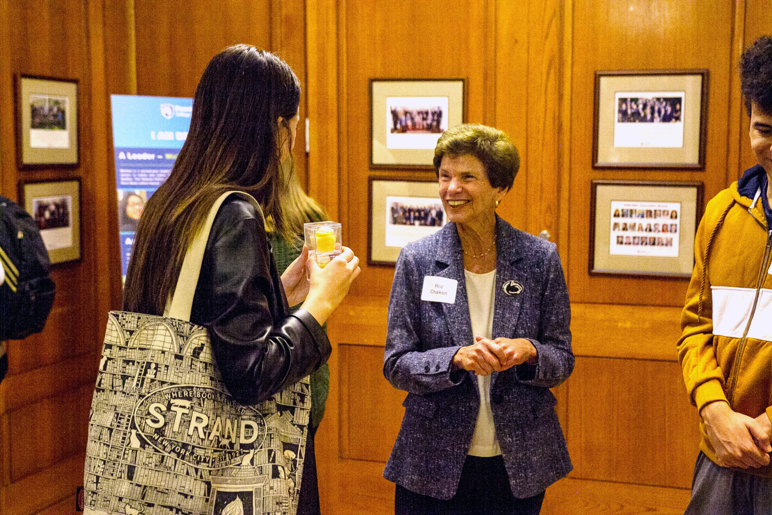 Gene and Roz Chaiken interact with Chaiken Scholars at the 2022 Chaiken Scholars Reception.