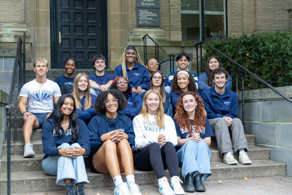 Liberal Arts peer advisers on the steps of Sparks Building in fall 2024