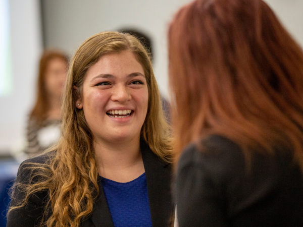 A Liberal Arts student interacts with an employer at the annual Liberal Arts Career Week.