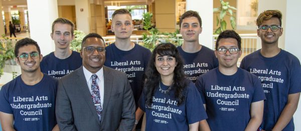 Liberal Arts Undergraduate Council members pose with Dean Lang.