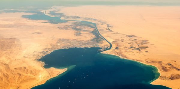 An aerial view of the Suez Canal, where the continents of Africa and Asia meet.