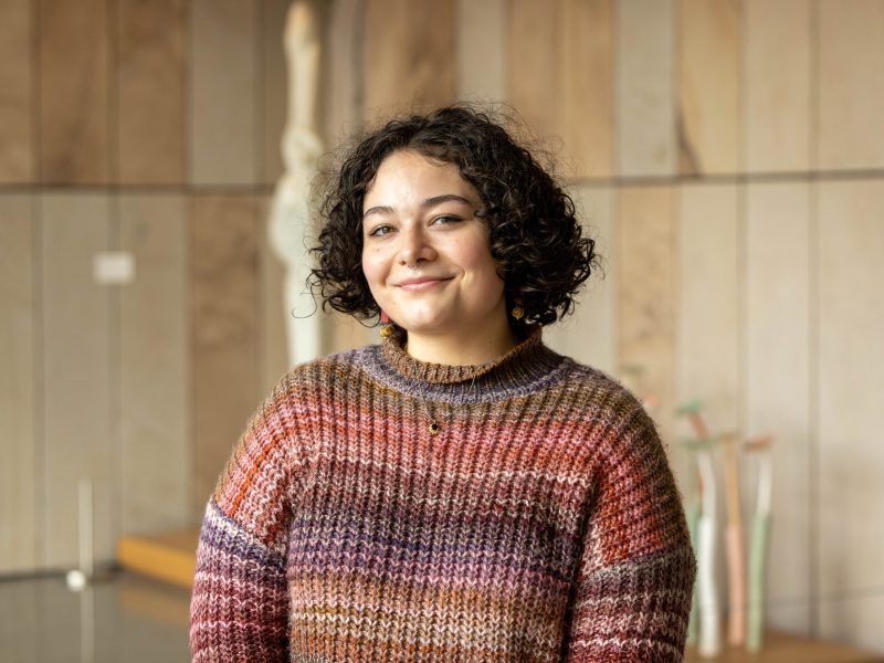 Amanda Demuth Amanda Demuth, who will graduate Penn State in 2027, stands inside the Palmer Art Museum wearing a striped sweater.