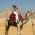 Fetterhoff, Lauren Lauren Fetterhoff sits atop a camel in front of the pyramids in Egypt.