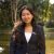 Jamie Nguyen Jamie Nguyen, Penn State spring 2024 graduate, stands in front of pond wearing a blue jacket and a name pin with the NBC Universal logo.