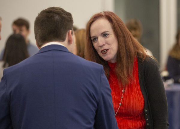 An alumna speaks to a student at Liberal Arts Career Week